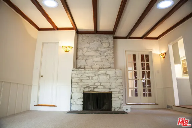 a living room with a fireplace