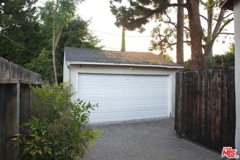 a house with trees in front of it