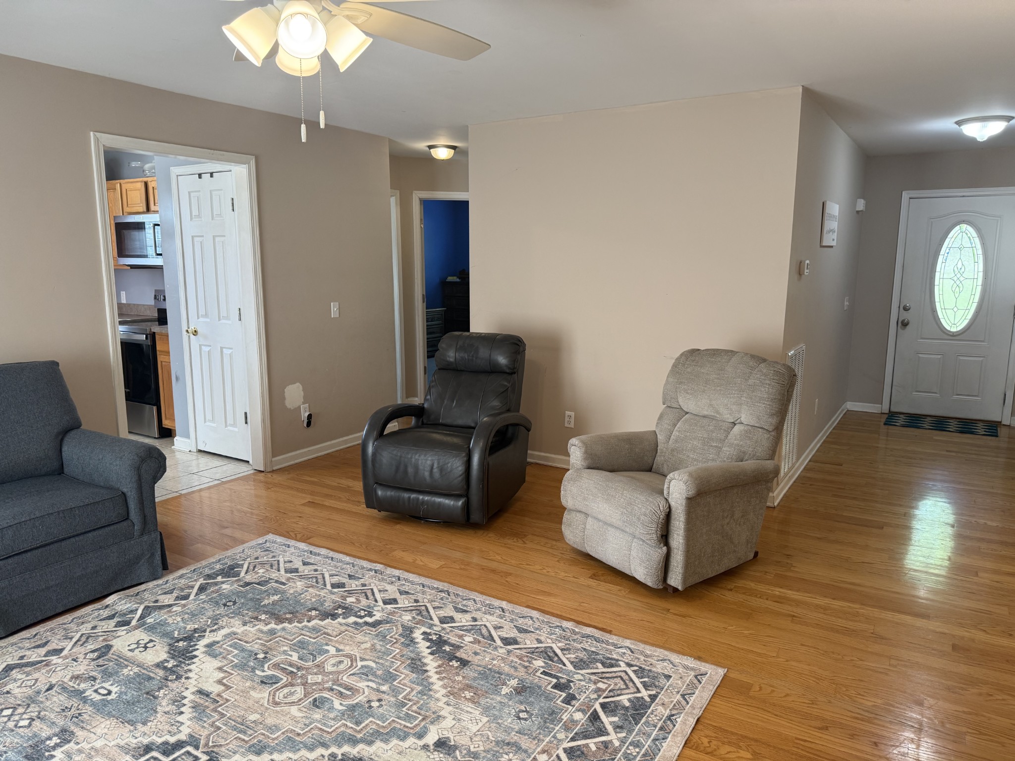 1702 Abiff Road Burns, TN 37029 - Photo 22 of 47 a living room with furniture rug and a lamp
