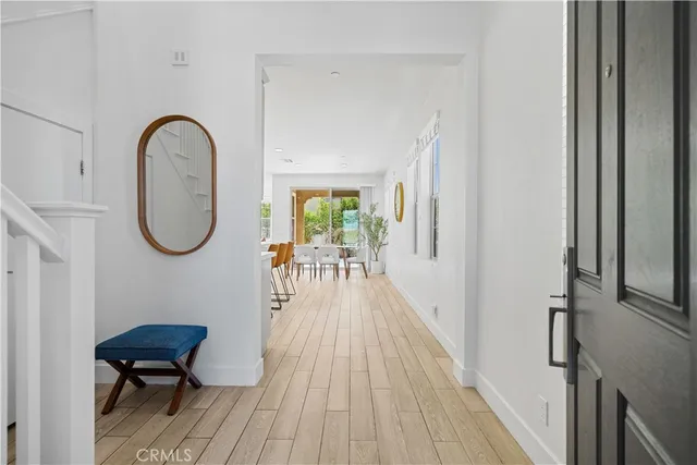 a view of entryway with wooden floor