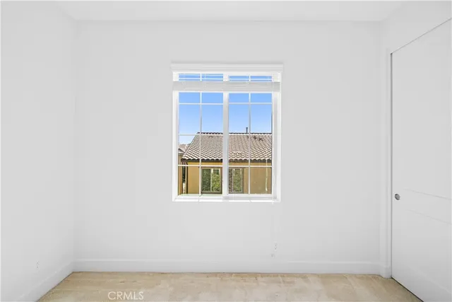 a view of a pathway both side of the house