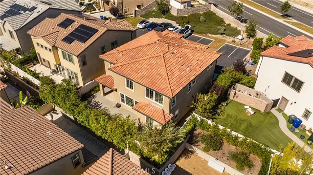 an aerial view of residential building and ocean view