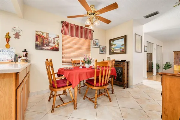 a kitchen with cabinets appliances and a sink