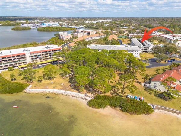 a view of a building with a garden
