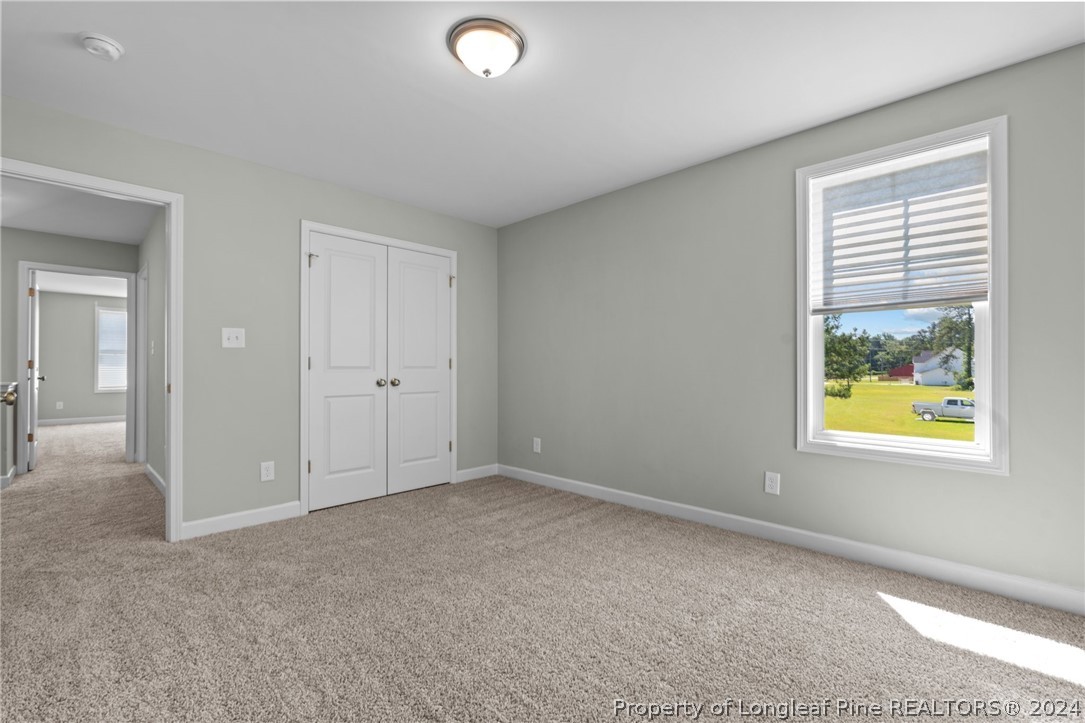 2632 Riddle Farm Road Fayetteville, NC 28306 - Photo 27 of 45 an empty room with windows