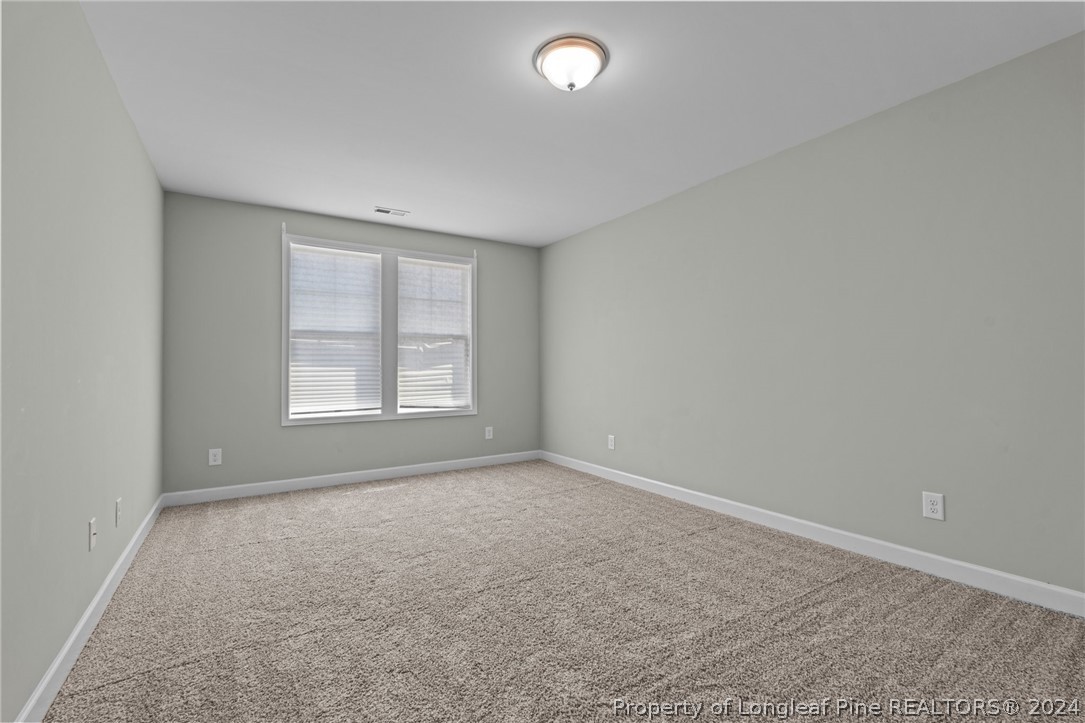 2632 Riddle Farm Road Fayetteville, NC 28306 - Photo 28 of 45 an empty room with a window