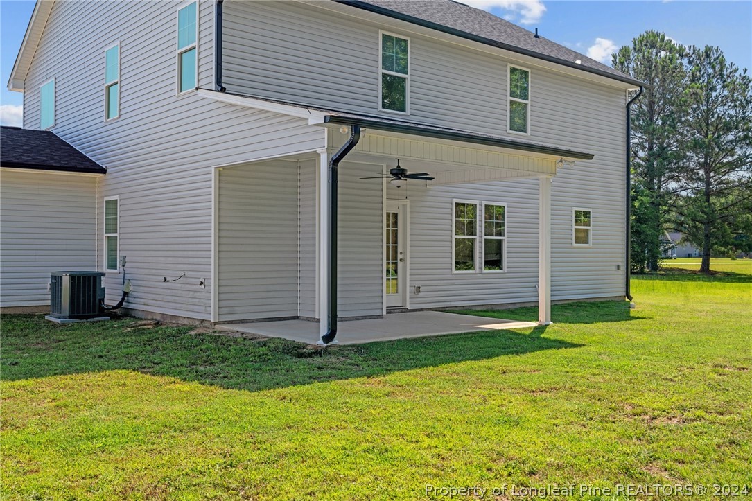 2632 Riddle Farm Road Fayetteville, NC 28306 - Photo 43 of 45 a view of a backyard with a garden