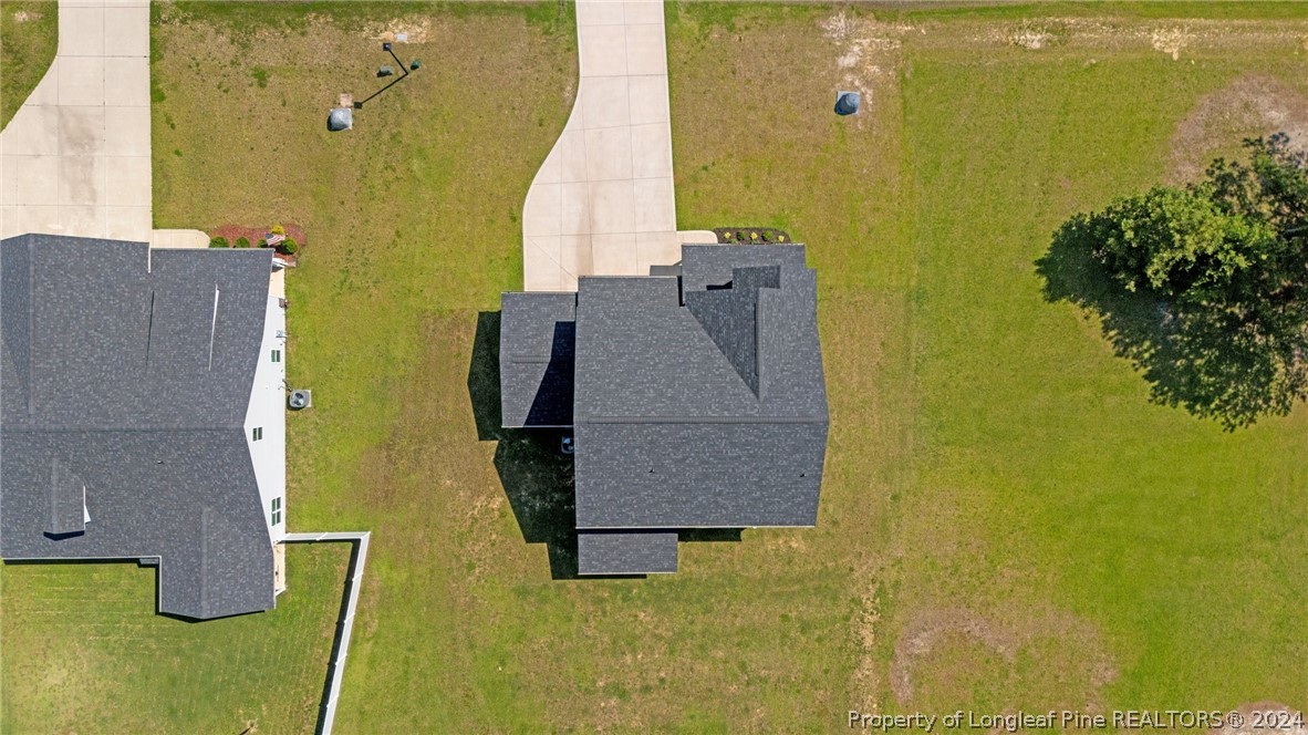 2632 Riddle Farm Road Fayetteville, NC 28306 - Photo 8 of 45 an aerial view of residential houses with outdoor space and swimming pool