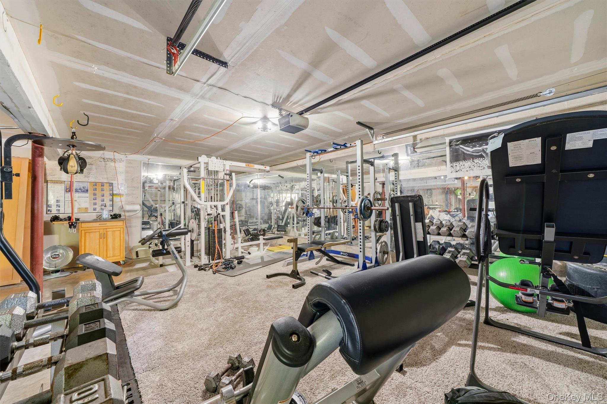 604 Ridgebury Road Slate Hill, NY 10973 - Photo 41 of 50 2 car garage currently used as an expansive exercise and weight room. Equipment is available for sale if desired.