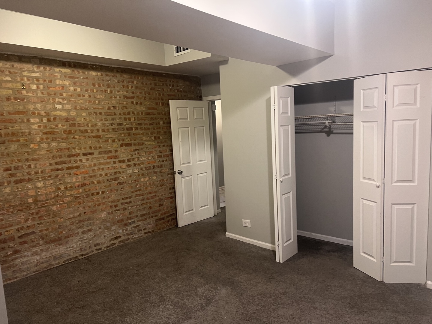 1430 East 69th Street, Unit 1S Chicago, IL 60637 - Photo 14 of 16 a view of an empty room