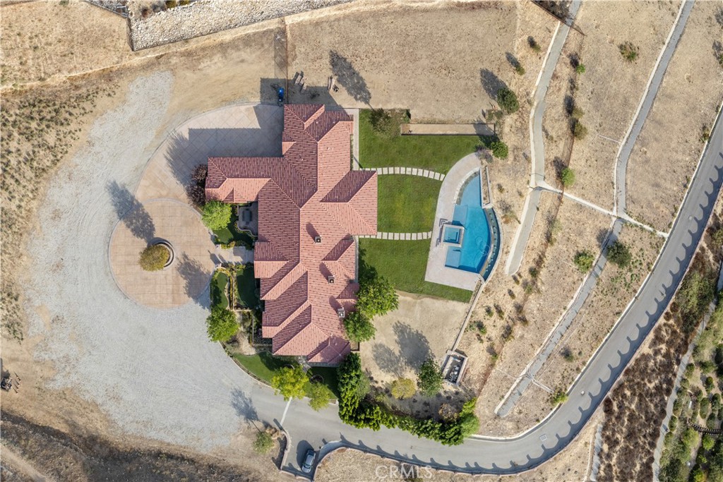 10727 West Stallion Ranch Road Shadow Hills, CA 91040 - Photo 36 of 39 an aerial view of a house with a swimming pool