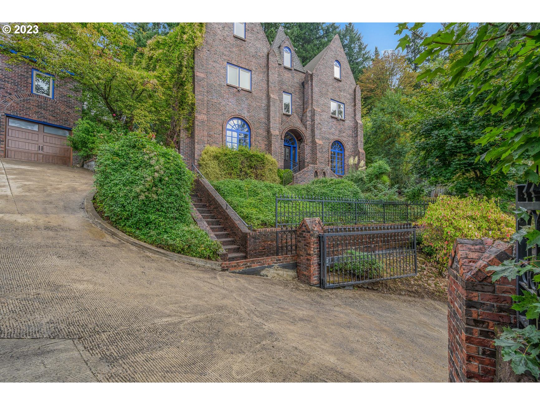 4224 Southwest Melville Avenue Portland, OR 97239 - Photo 3 of 48 a aerial view of a house with a yard and plants