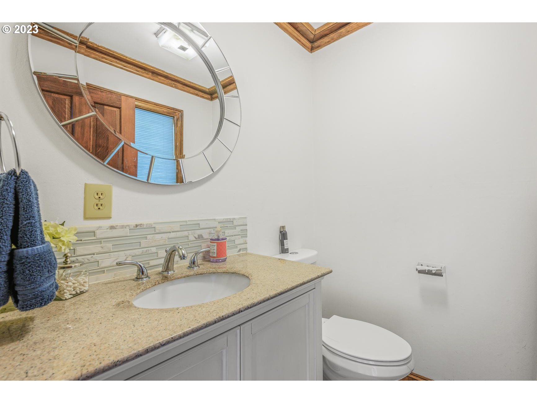 4224 Southwest Melville Avenue Portland, OR 97239 - Photo 38 of 48 a bathroom with a sink and a mirror