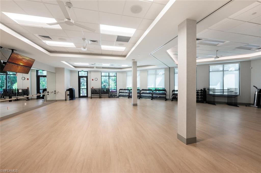 8600 Cedar Hammock Circle, Unit 1313 Naples, FL 34112 - Photo 33 of 48 a view of a an empty room with a ocean view