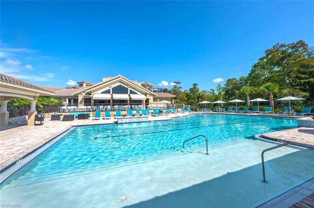 8600 Cedar Hammock Circle, Unit 1313 Naples, FL 34112 - Photo 39 of 48 a view of swimming pool from a lake view
