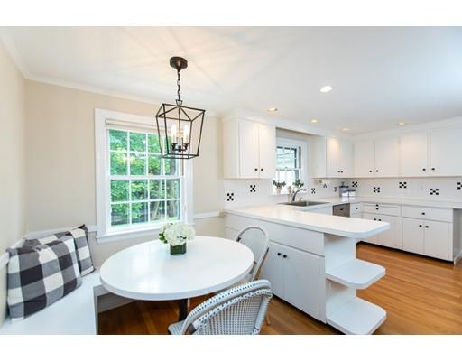 82 Bristol Road Wellesley, MA 02481 - Photo 11 of 26 a kitchen with a sink a window and dining table