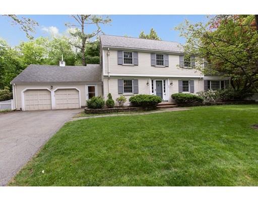 82 Bristol Road Wellesley, MA 02481 - Photo 2 of 26 a front view of a house with a yard and trees
