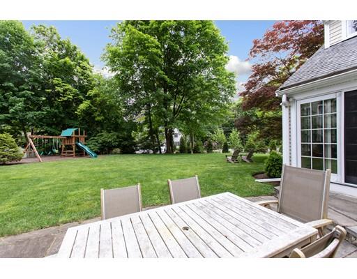 82 Bristol Road Wellesley, MA 02481 - Photo 26 of 26 a view of a wooden dinning table and chairs in the garden
