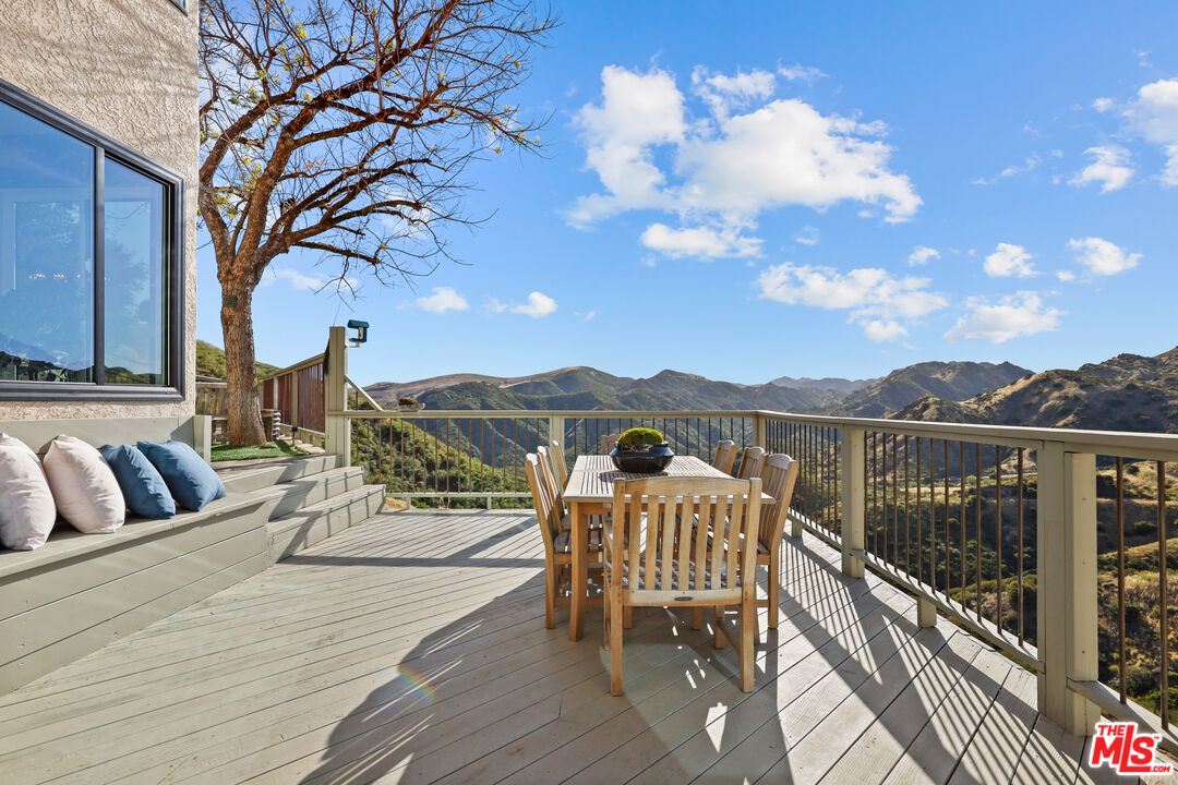 53 Saddlebow Road Bell Canyon, CA 91307 - Photo 26 of 66 a view of a balcony with furniture