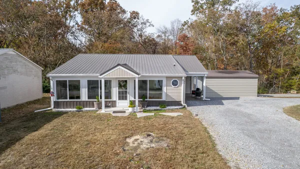 front view of a house with a patio