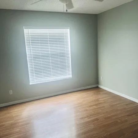 a view of a room that has a window in it