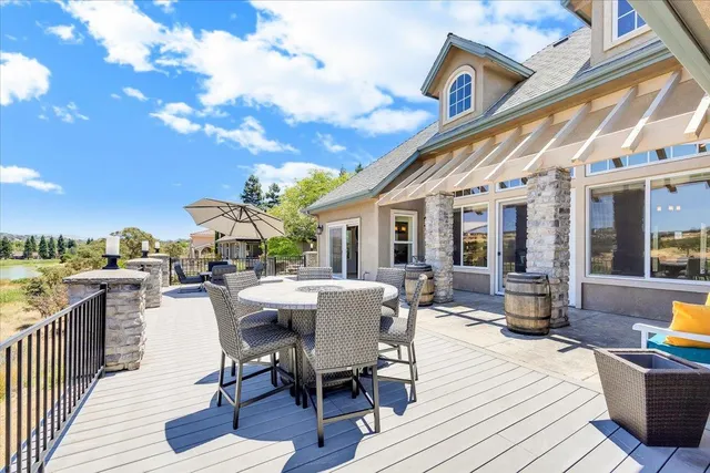 a bathroom with a sink a mirror and vanity