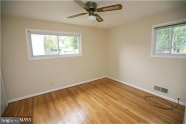 12924 Georgia Avenue Silver Spring, MD 20906 - Photo 11 of 19 an empty room with a window