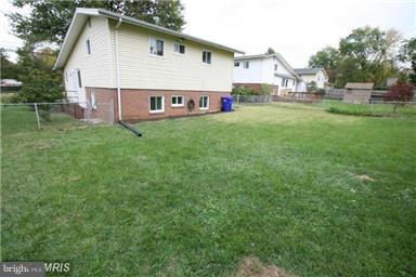 12924 Georgia Avenue Silver Spring, MD 20906 - Photo 19 of 19 a view of a house with a yard and sitting area
