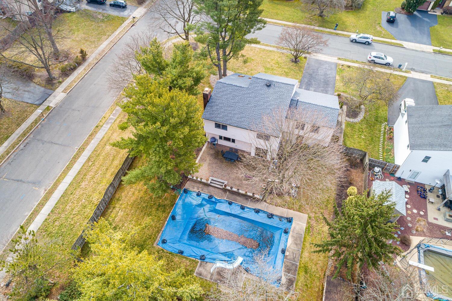 24 Harper Road Monmouth Junction, NJ 08852 - Photo 54 of 64 a aerial view of a house with swimming pool