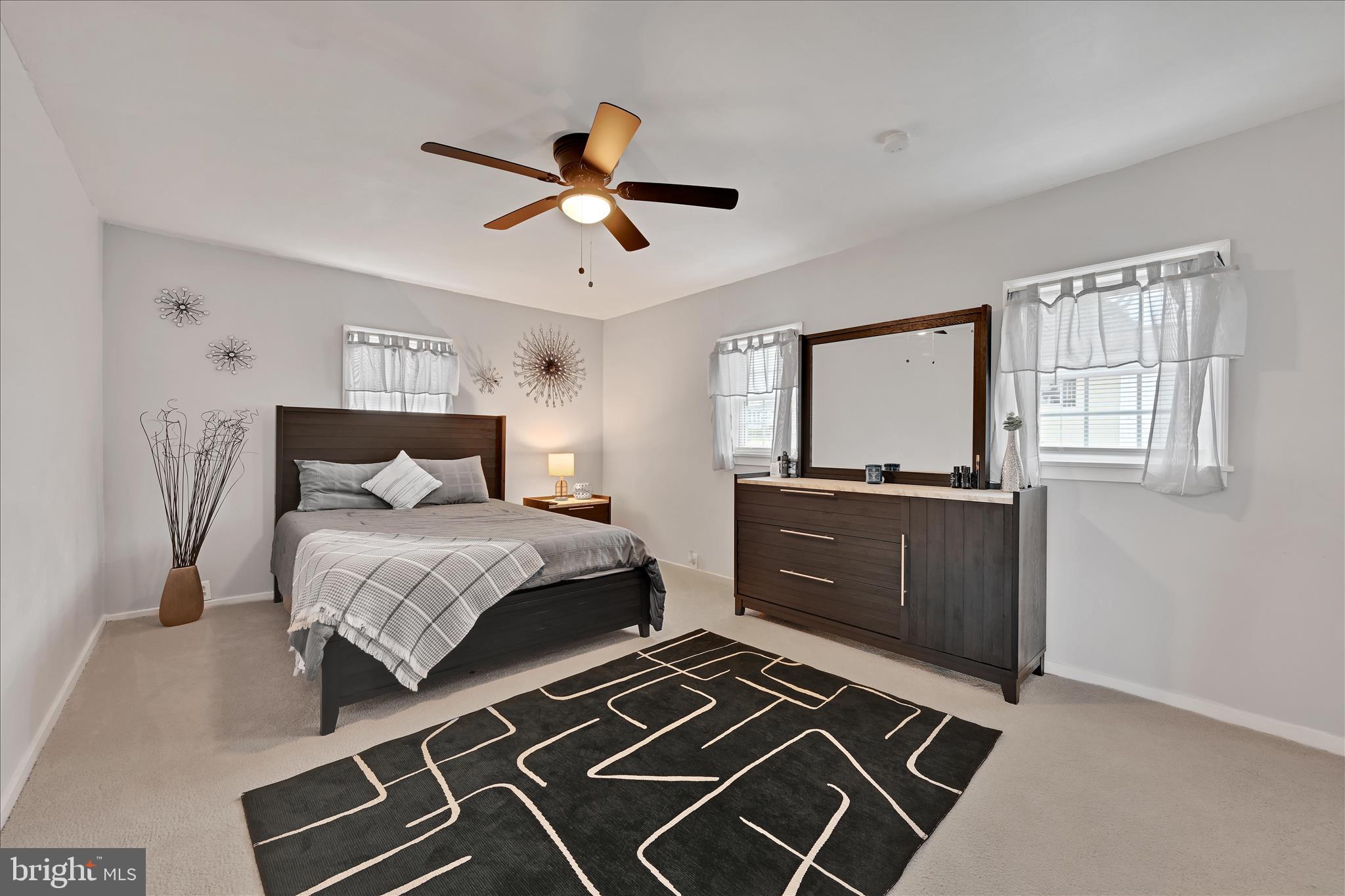 1428 Meade Street Reading, PA 19607 - Photo 19 of 29 a bedroom with a bed and a dresser