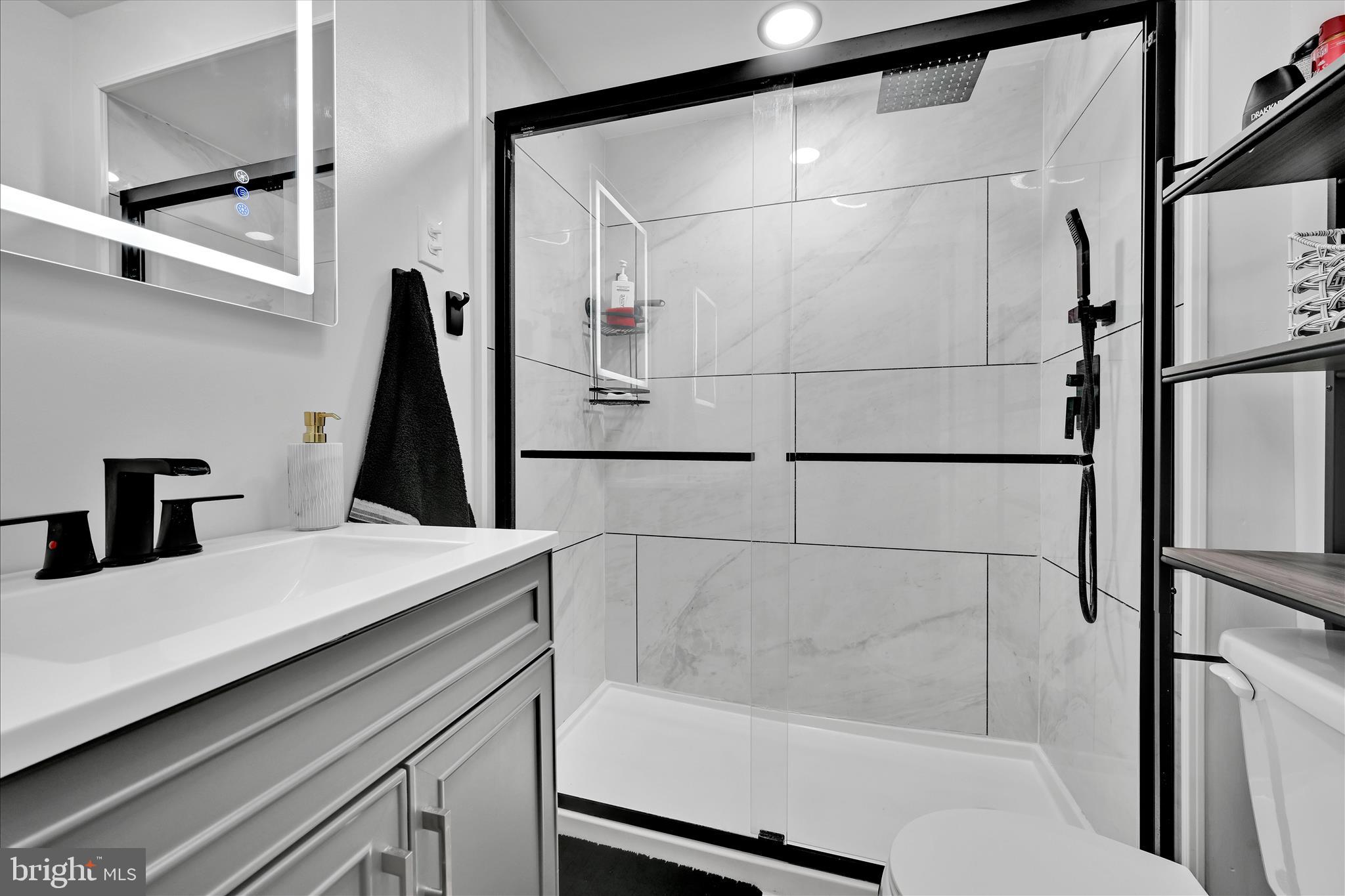 1428 Meade Street Reading, PA 19607 - Photo 22 of 29 a bathroom with a bathtub and a shower