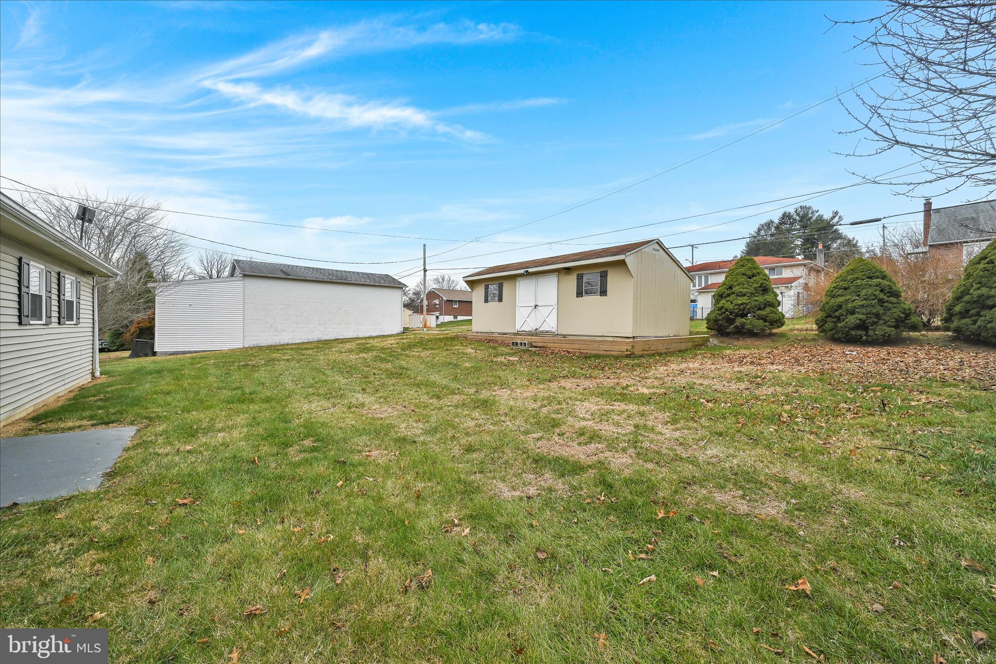 1428 Meade Street Reading, PA 19607 - Photo 26 of 29 a view of a yard with an house and wooden fence