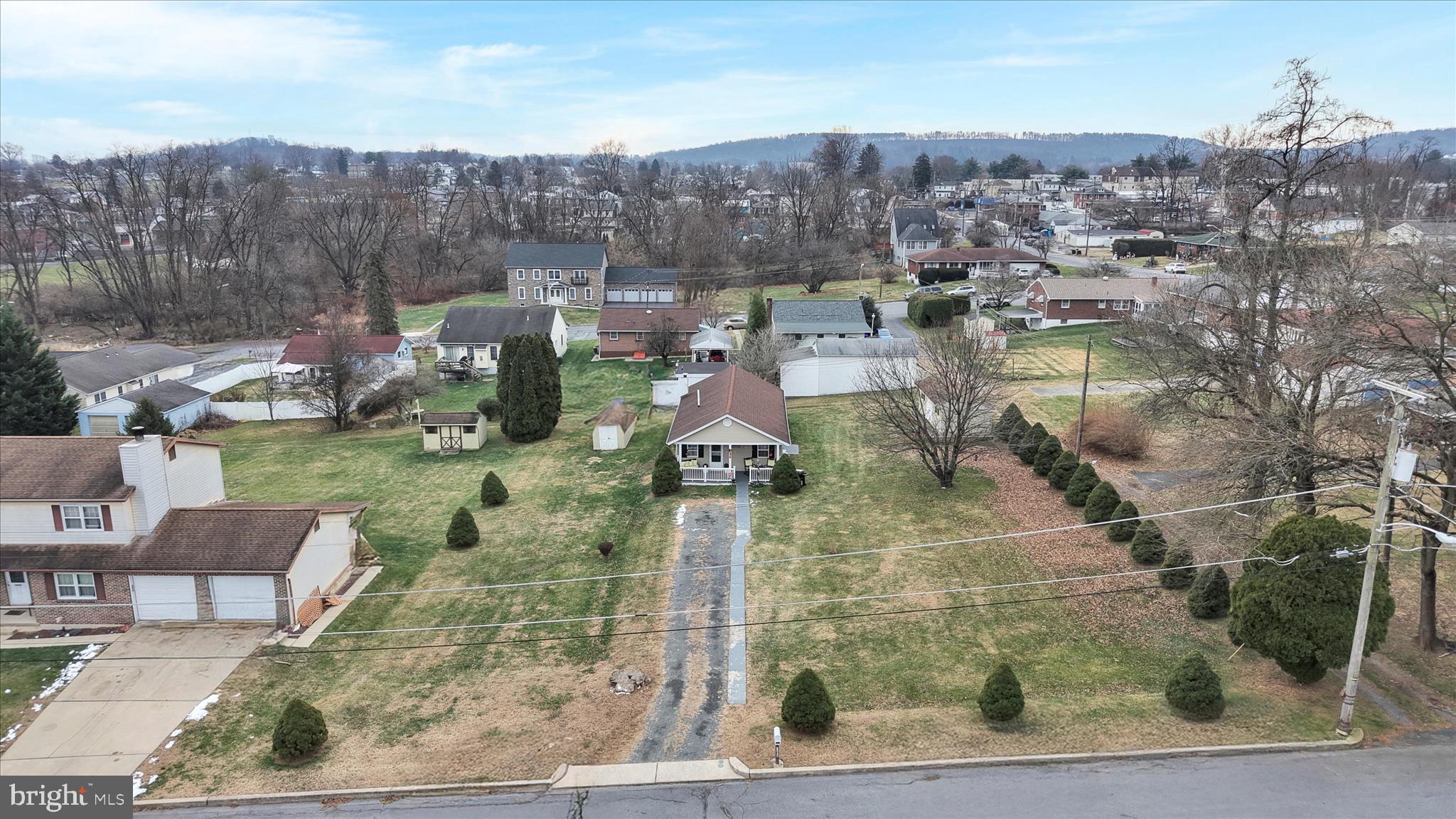 1428 Meade Street Reading, PA 19607 - Photo 4 of 29 an aerial view of residential houses with outdoor space and parking