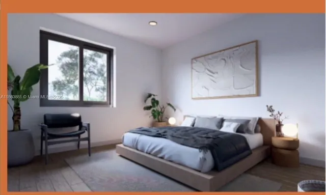 a bedroom with a bed and a couch