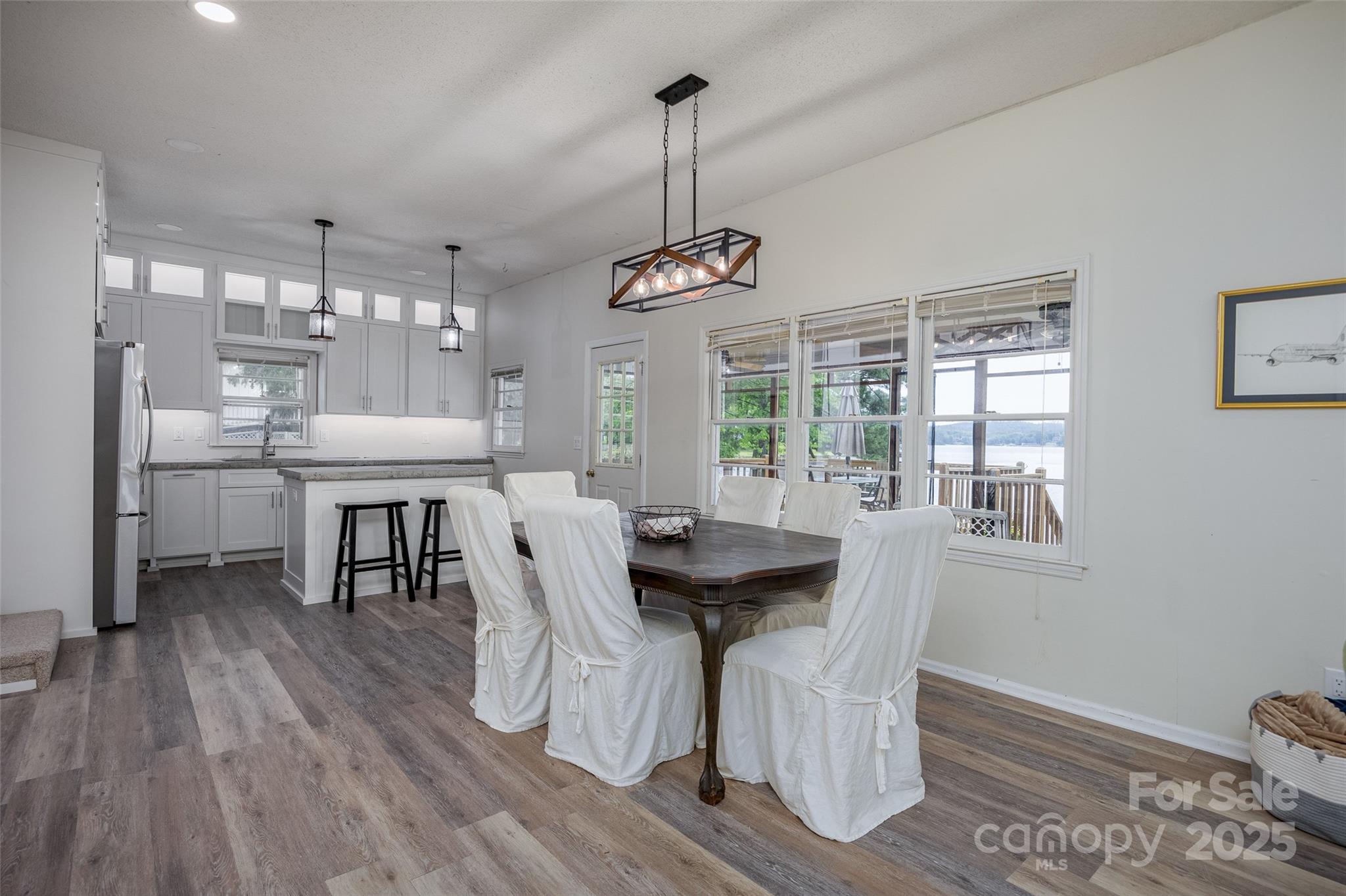 1805 Lake Shore Road Camden, SC 29020 - Photo 14 of 48 a dining room with furniture window wooden floor