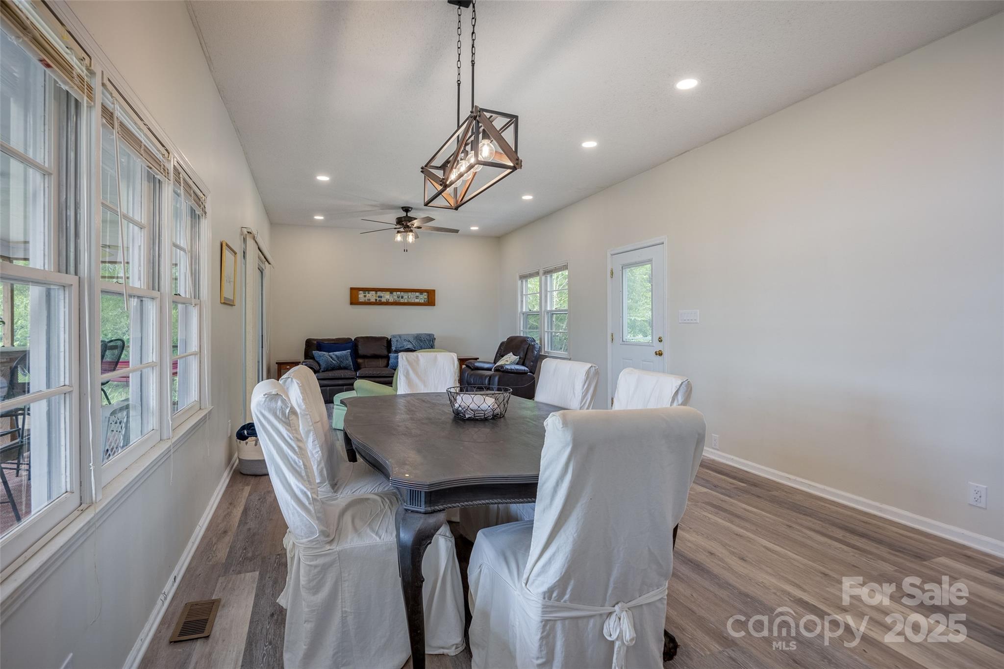 1805 Lake Shore Road Camden, SC 29020 - Photo 16 of 48 a view of a dining room with furniture window and wooden floor