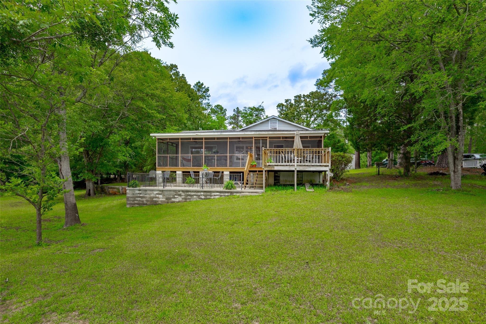 1805 Lake Shore Road Camden, SC 29020 - Photo 2 of 48 a view of a house with a backyard patio and swimming pool