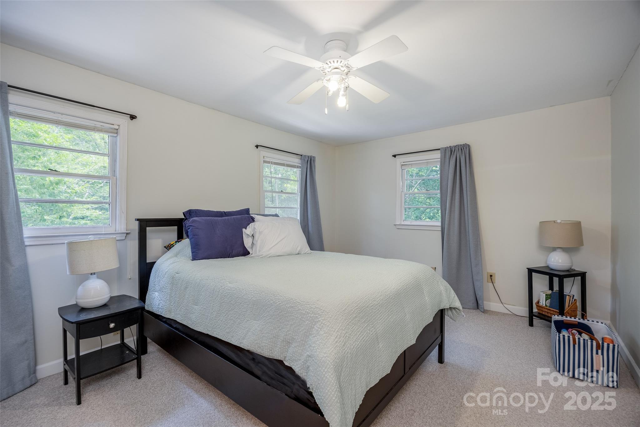 1805 Lake Shore Road Camden, SC 29020 - Photo 23 of 48 a bedroom with a bed and a table in it with window
