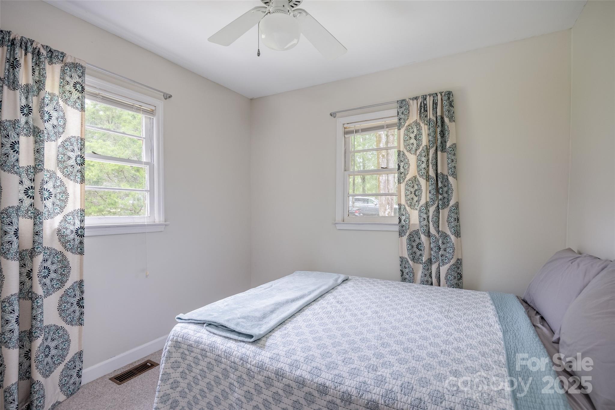 1805 Lake Shore Road Camden, SC 29020 - Photo 26 of 48 a bedroom with a bed and a window
