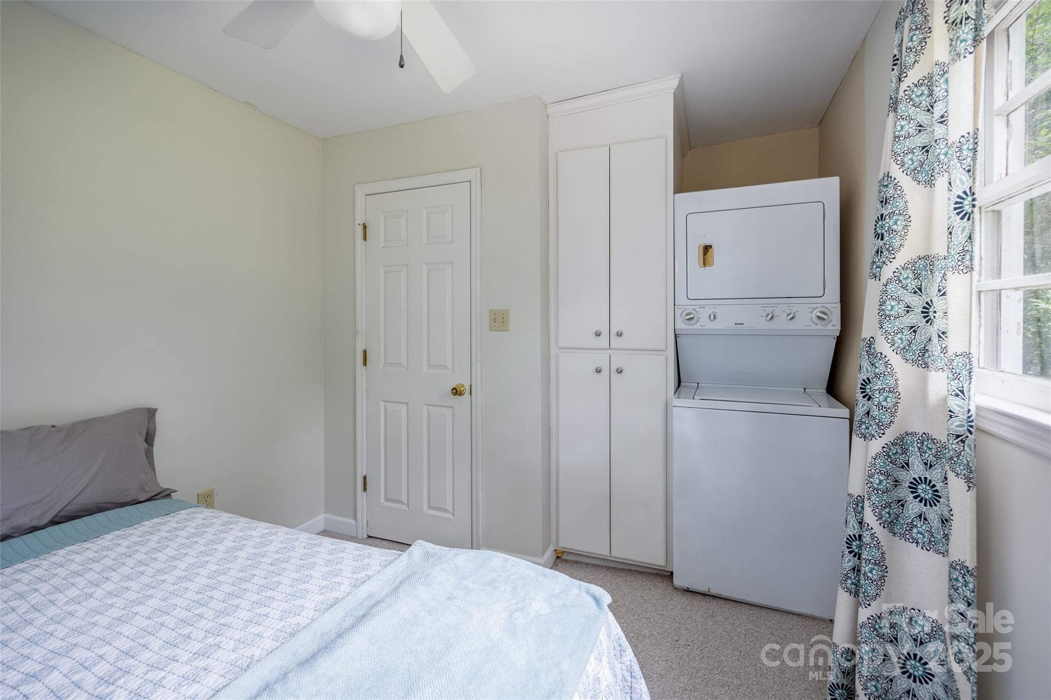 1805 Lake Shore Road Camden, SC 29020 - Photo 27 of 48 a bedroom with a bed and a curtain