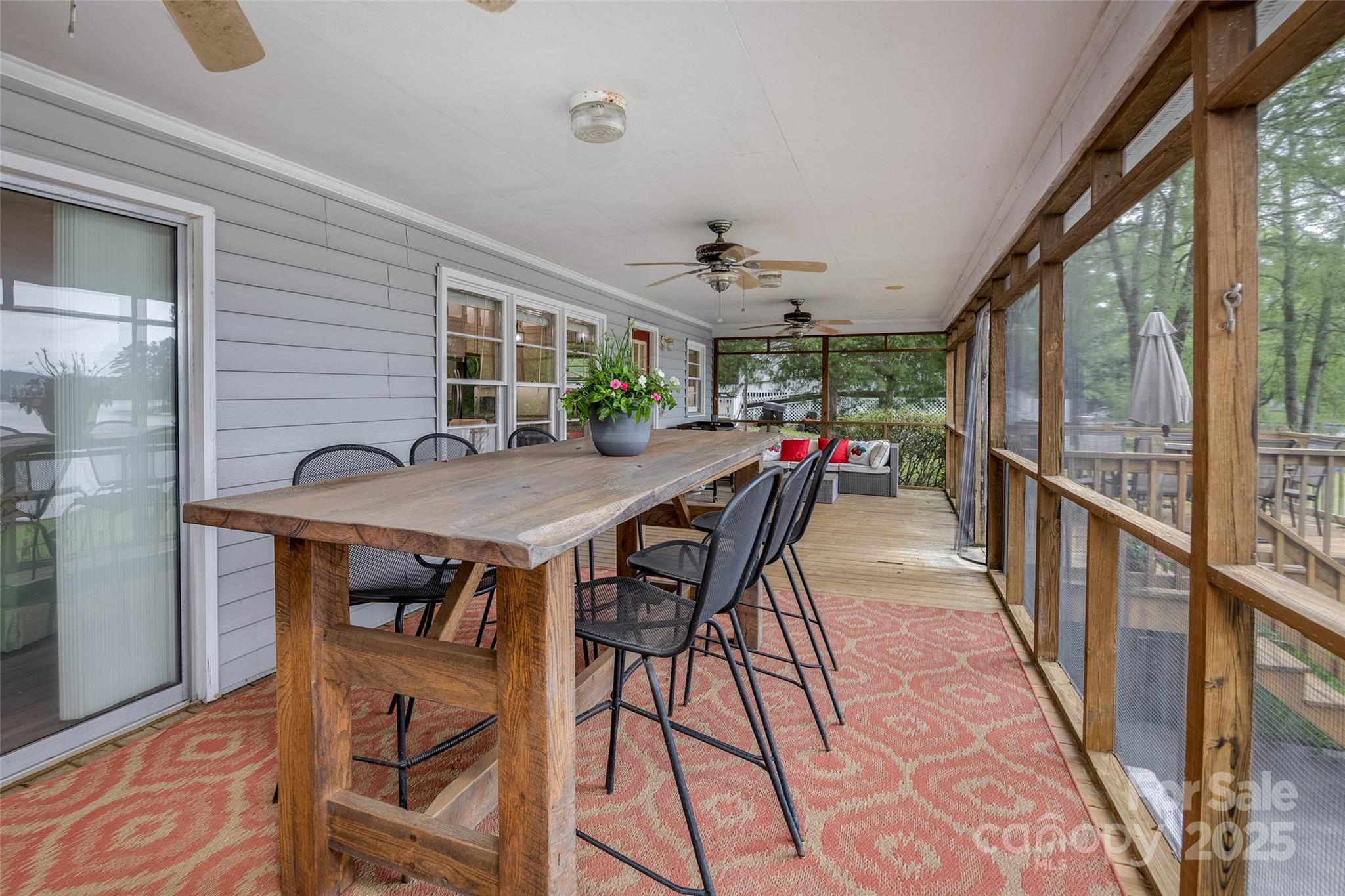 1805 Lake Shore Road Camden, SC 29020 - Photo 31 of 48 a view of a dining room with furniture window and wooden floor