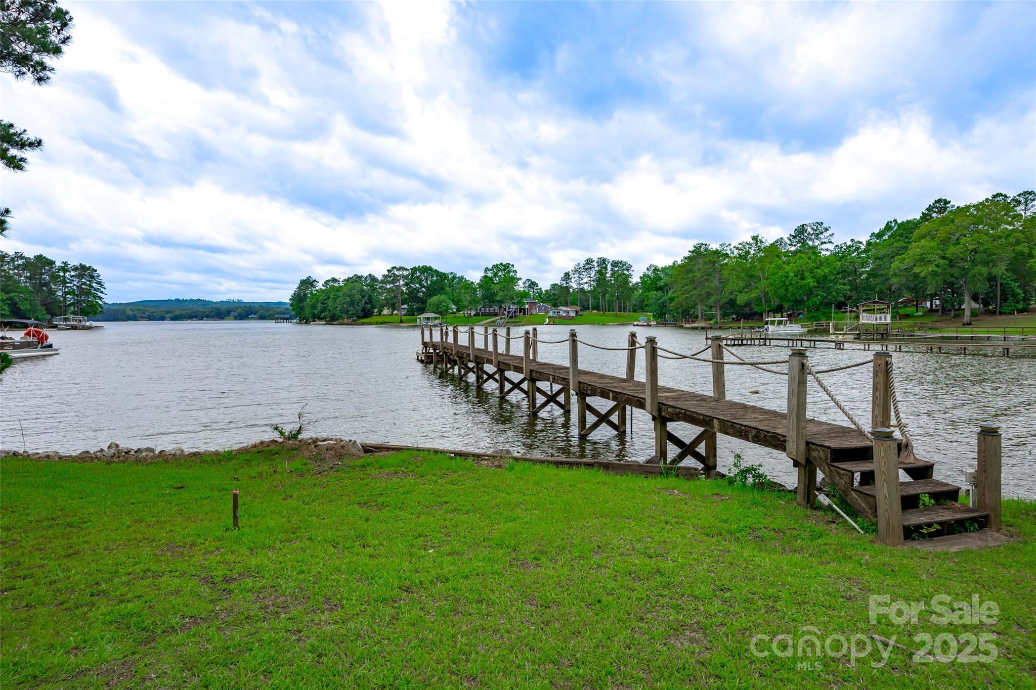 1805 Lake Shore Road Camden, SC 29020 - Photo 43 of 48 a view of a garden with sitting area