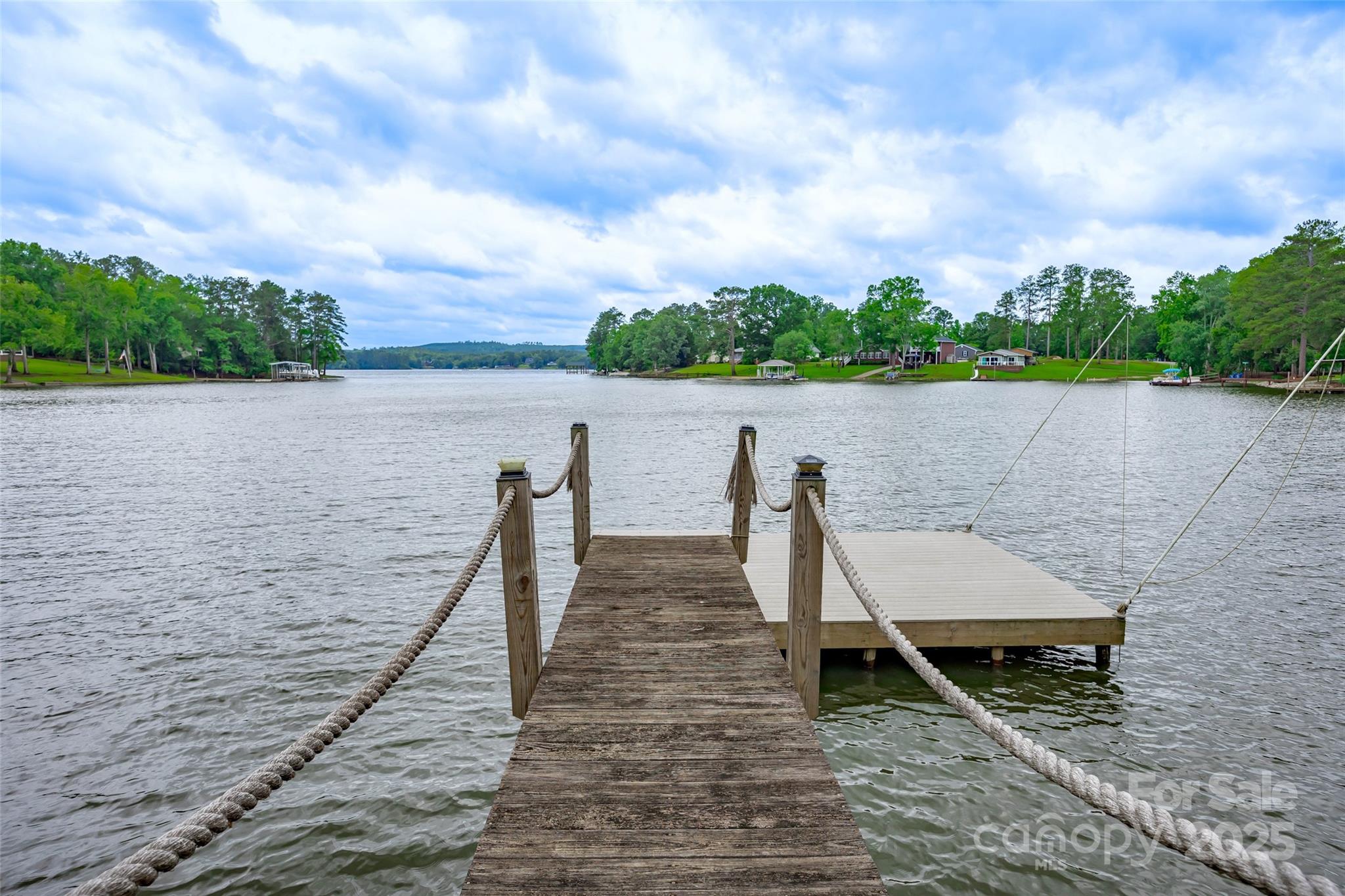 1805 Lake Shore Road Camden, SC 29020 - Photo 45 of 48 a wooden floor and lake in the background