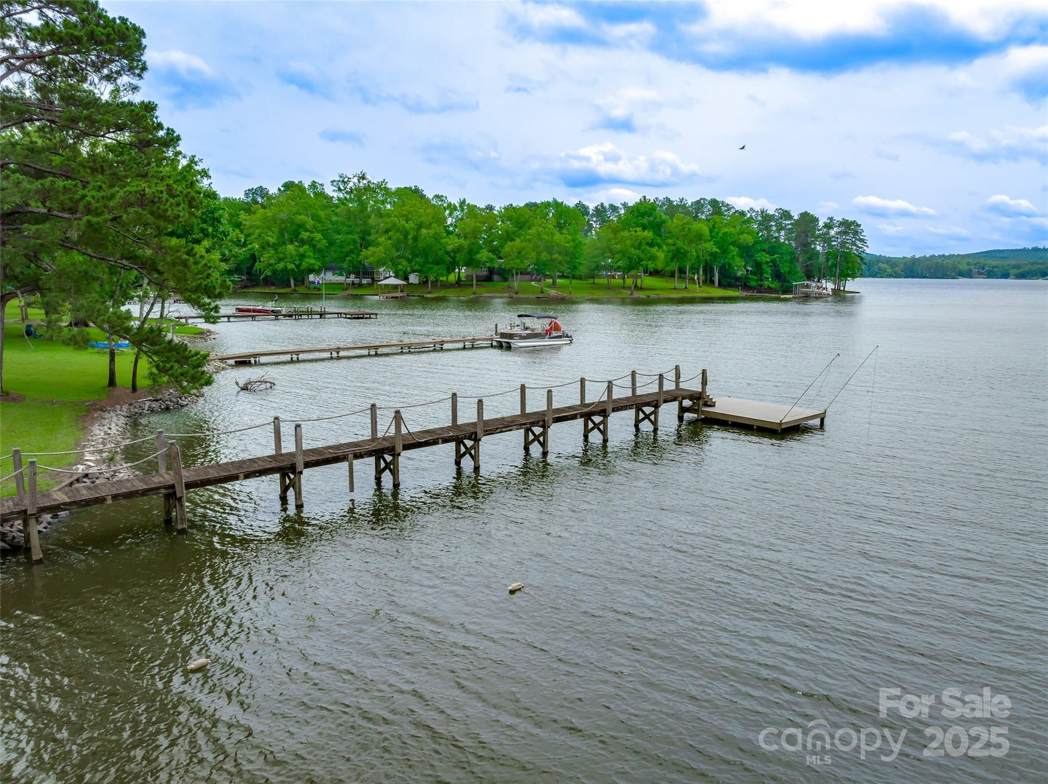 1805 Lake Shore Road Camden, SC 29020 - Photo 47 of 48 a view of a lake with outdoor seating