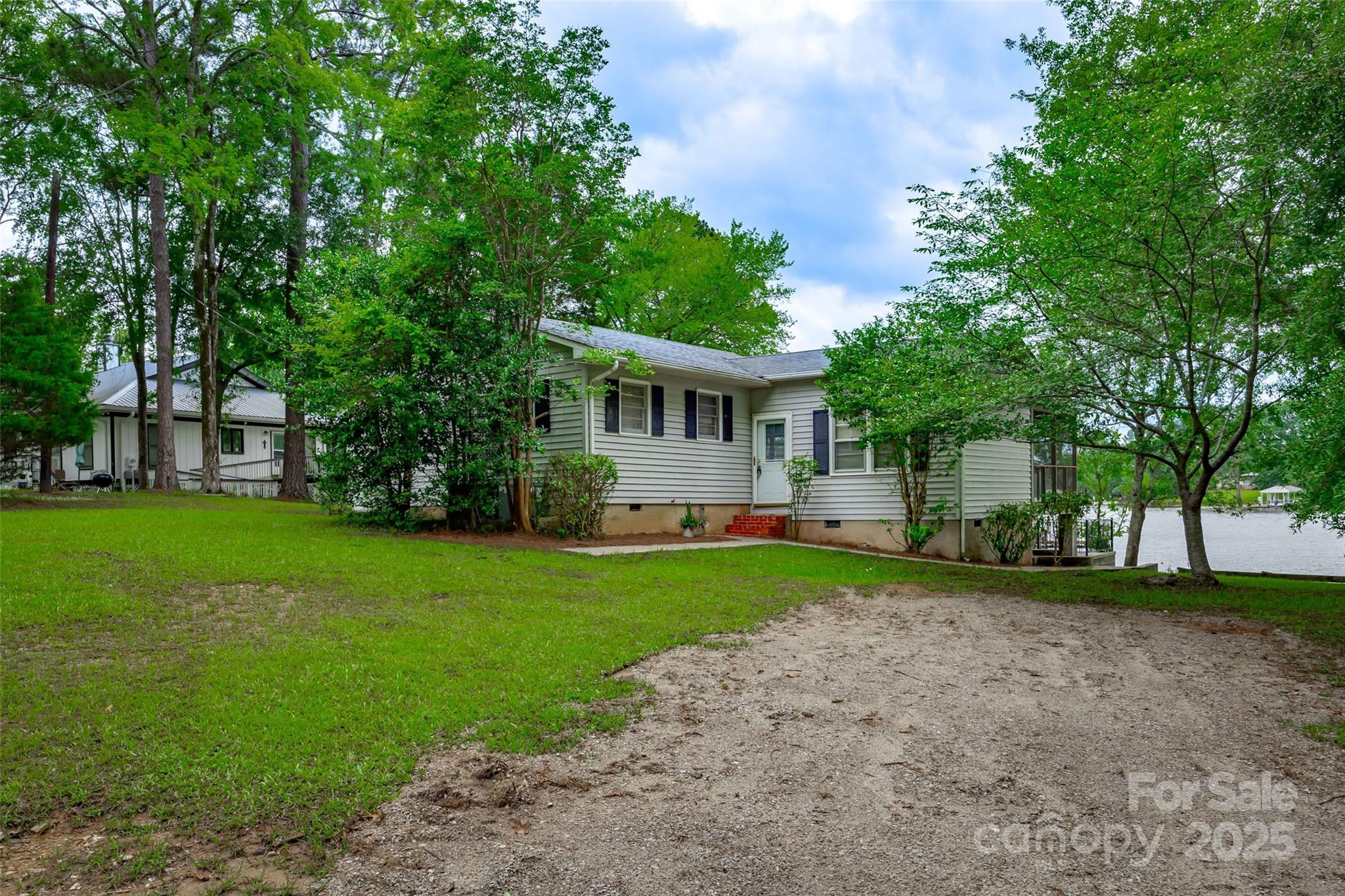 1805 Lake Shore Road Camden, SC 29020 - Photo 7 of 48 a view of a house with backyard and garden