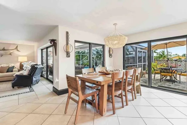a spacious bedroom with a bed and a large window