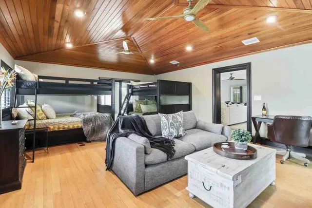 an aerial view of residential building and ocean