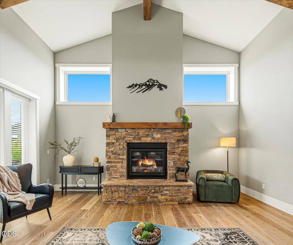 61333 Kindle Rock Loop Bend, OR 97702 - Photo 26 of 53 a living room with furniture and a fireplace
