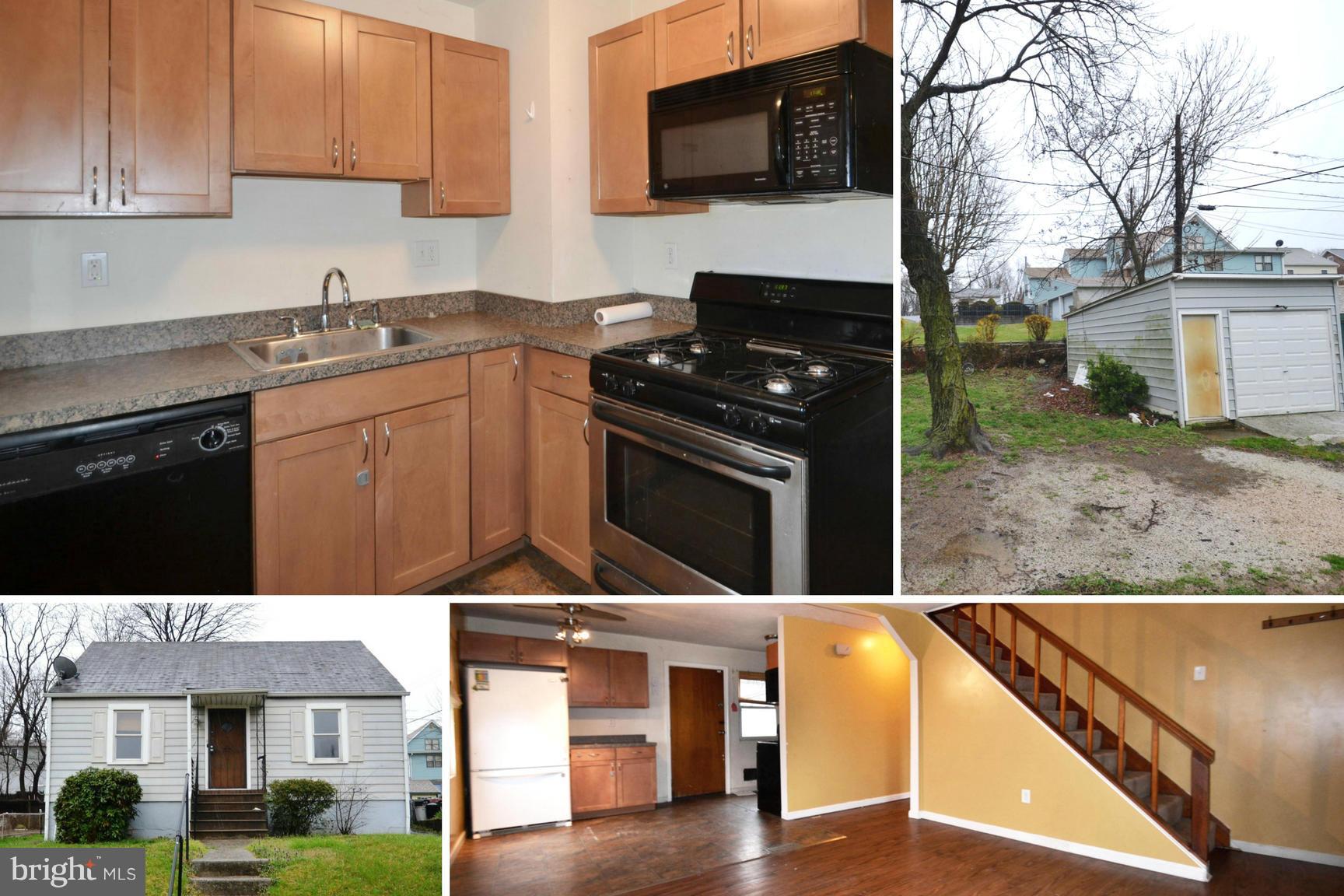 3211 Rosalie Road Baltimore, MD 21227 - Photo 1 of 25 a kitchen with stainless steel appliances granite countertop a stove a sink and a microwave