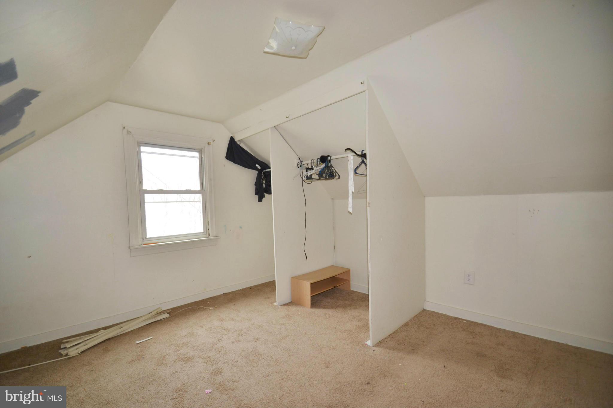 3211 Rosalie Road Baltimore, MD 21227 - Photo 20 of 25 an empty room with a window